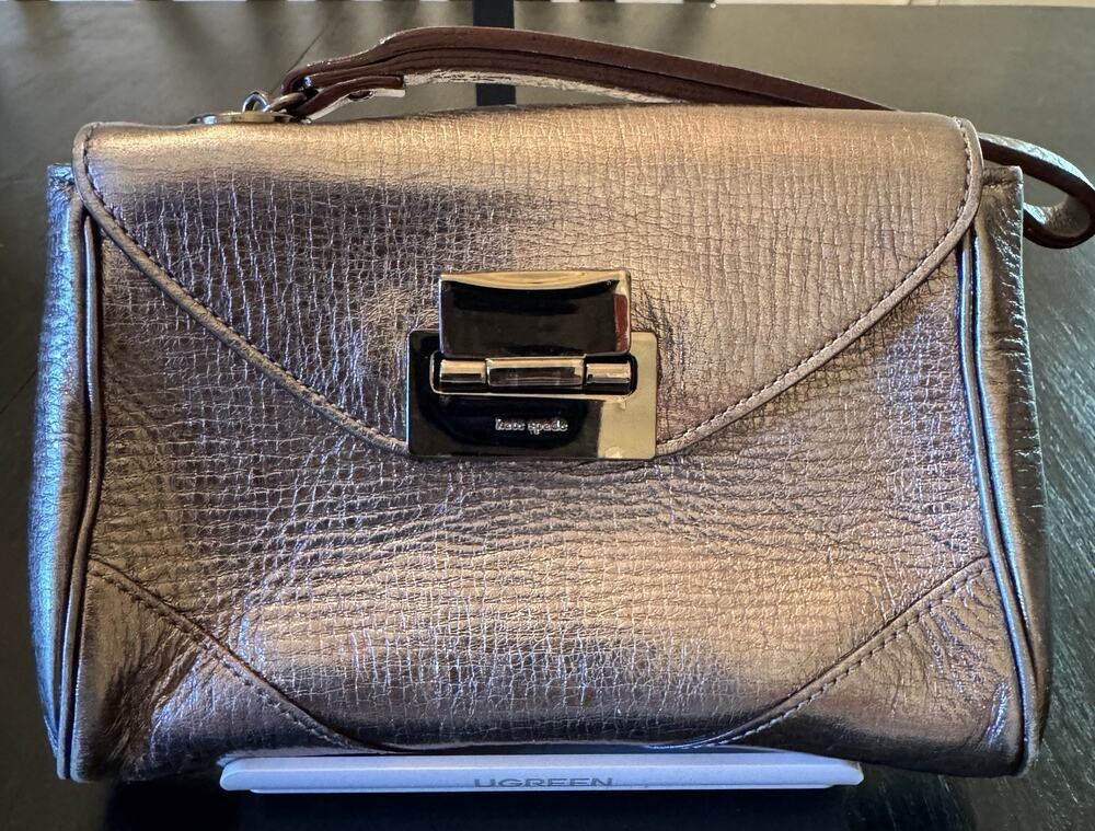 Kate Spade New York Harrison Street Metallic Leather Clutch Wristlet In Pewter